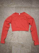 Orange long sleeve top